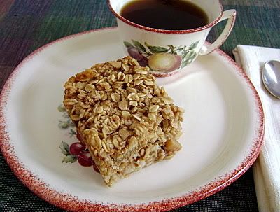 /><br/> <br/> <br/> With fall just around the corner (where DID the summer go?)-this is a  great recipe to use all of the wonderful fresh picked apples that will be hitting the farm stands.  It makes a nice big pan and gives us breakfast for the whole week.<br/> <br/> What a treat this is. It sort of reminds me of an apple crisp, but it's soft. </div> <div> </div> <div>We used a plate when we took these photos so that the layers of oatmeal and fruit would show.  When I serve this, I put the square in a bowl to heat up and serve it as I would a bowl of oatmeal.</div> <div> </div> <div>What I love the most about it is a small square fills you up and stays with you right through the morning-for me, right into the afternoon.</div> <div> </div> <div>The only thing I added to the recipe is some vanilla extract to enhance the flavor-and I was generous with the cinnamon too.</div> <div>I've made a lot of variations of this recipe since this first attempt-using everything from blueberries to strawberries (the strawberry one was my husband's favorite).  The oatmeal topping is a blank canvas to showcase your favorite fruit as the base. There are so many possibilities using this basic oatmeal topping and I hope to try a whole lot more of them.  </div> <div><br/> Carol<br/> <br/> <br/> <img src=